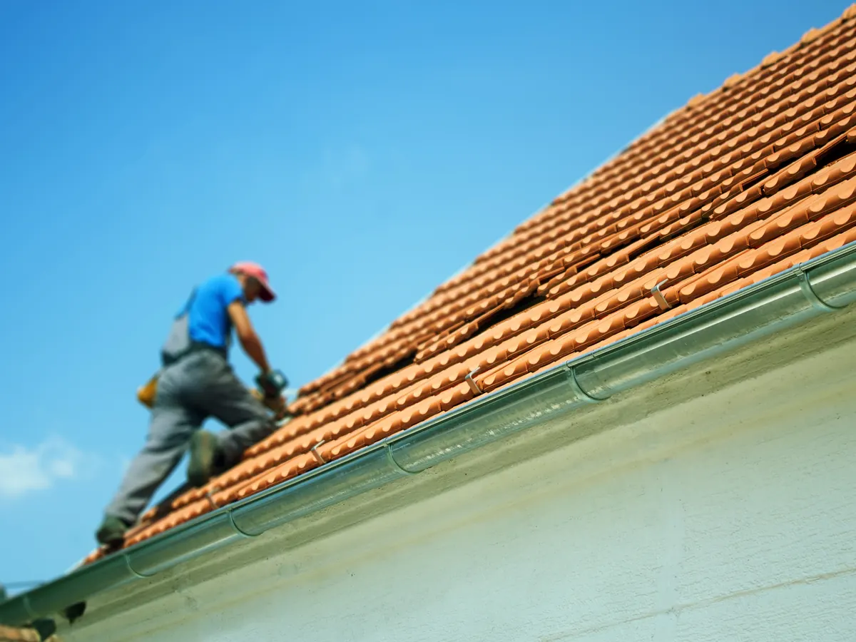 Close view of dry ridge roofing work in progress