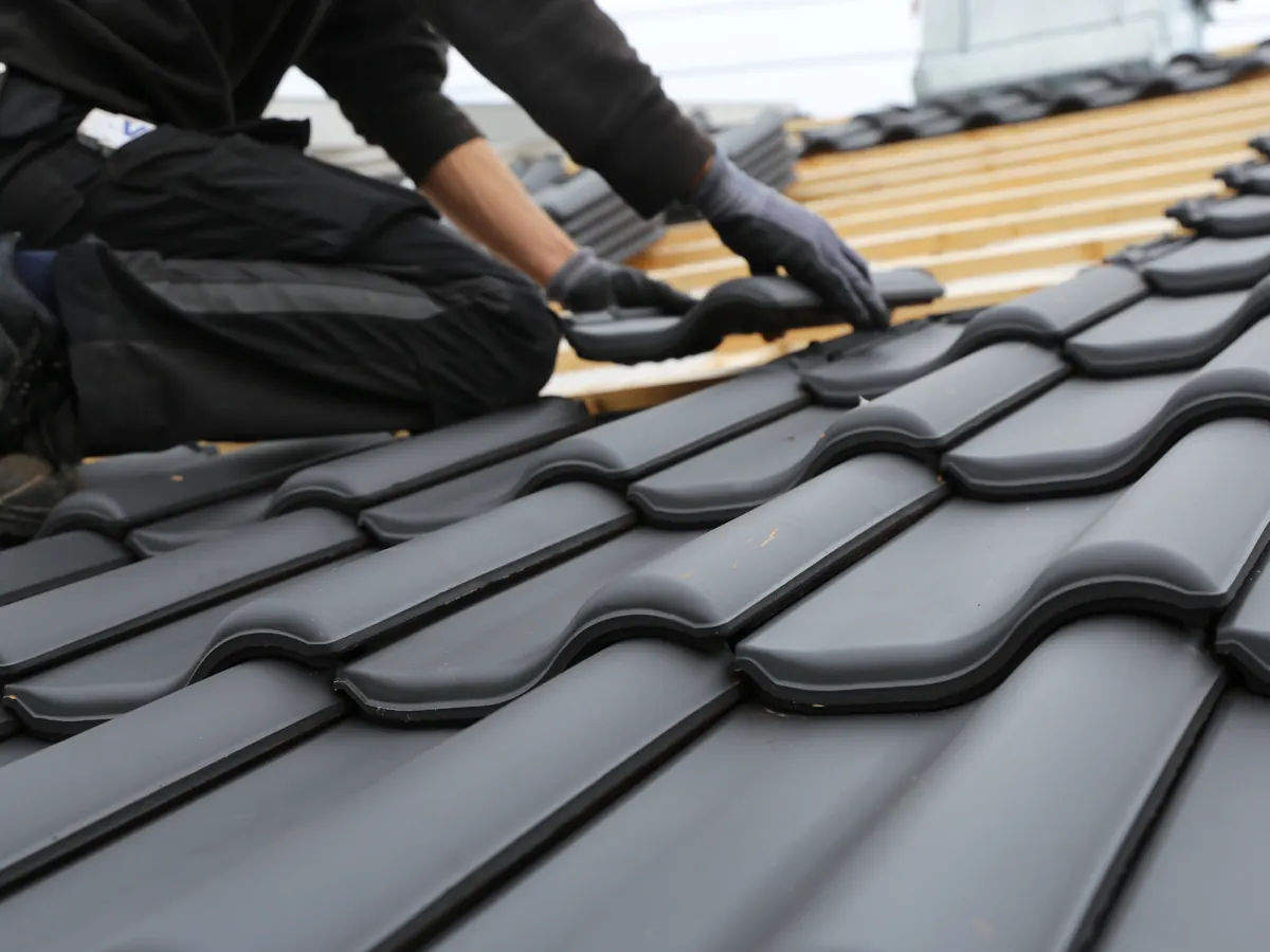 Close view of tile roofs work in progress