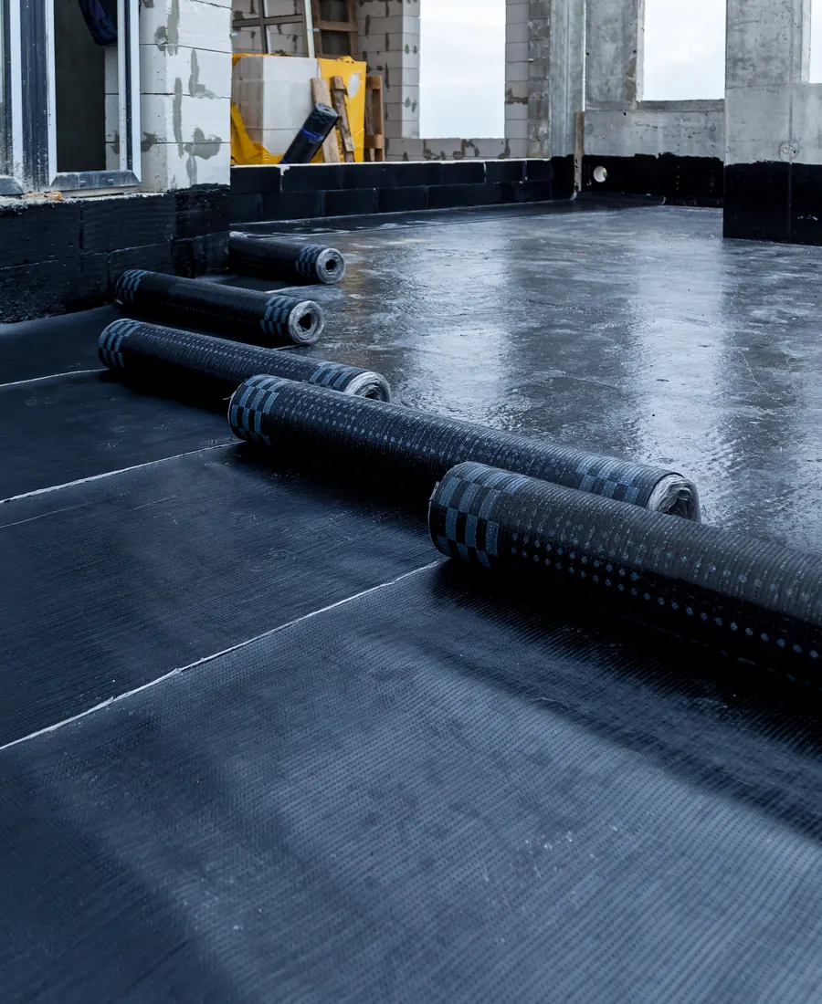 Rubber membrane flat roof being finished around an upstand